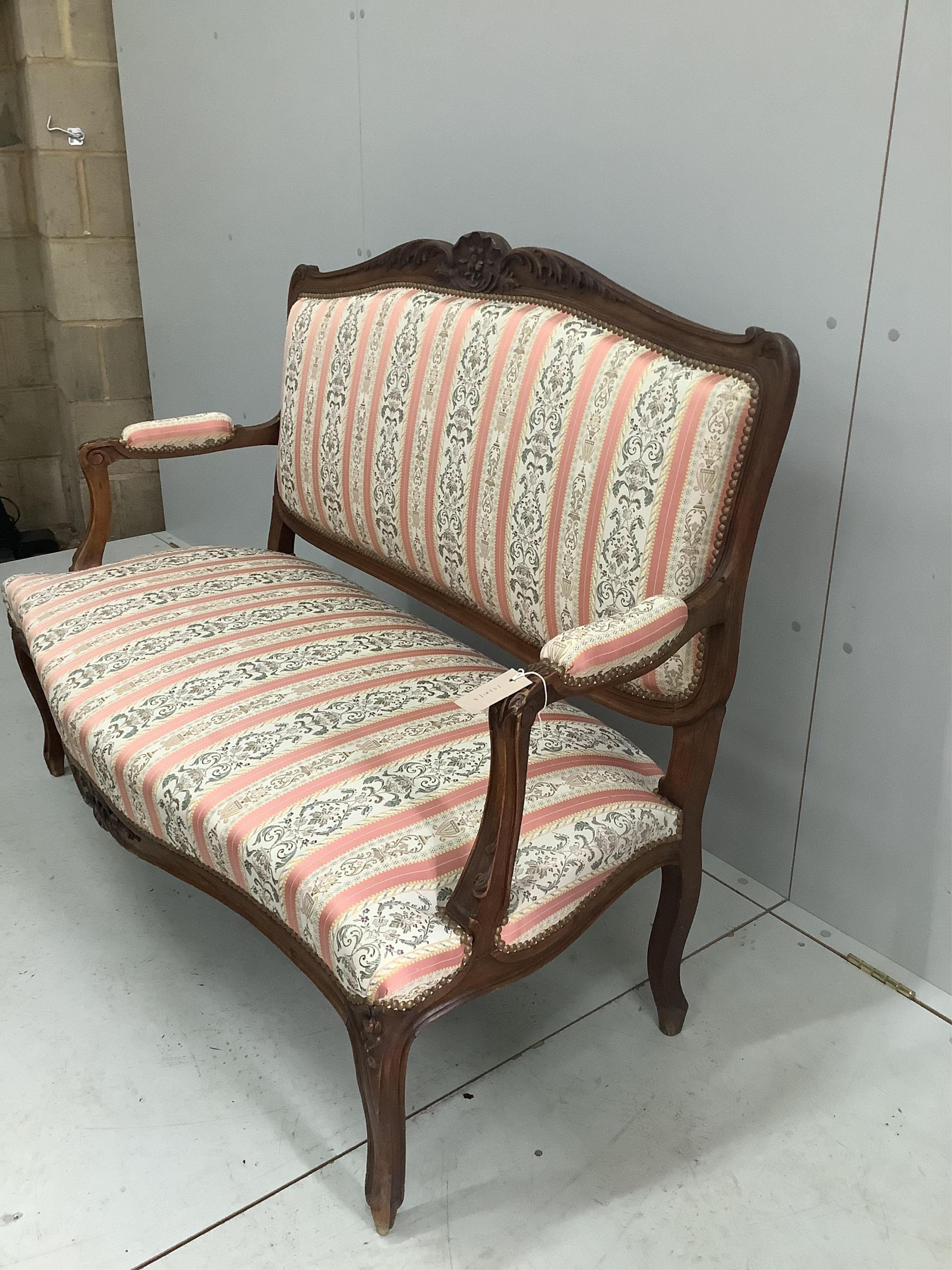 An early 20th century French beech upholstered sofa, width 130cm, depth 53cm, height 96cm. Condition - good